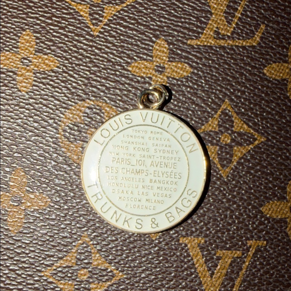 Beautiful white Upcycled Louis Vuitton trunks and bags charm